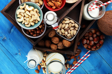 Alternative types of milks. Vegan substitute dairy milk with nuts