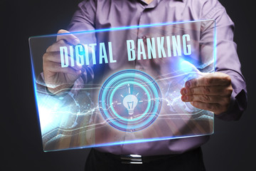 The concept of business, technology, the Internet and the network. A young entrepreneur working on a virtual screen of the future and sees the inscription: Digital banking