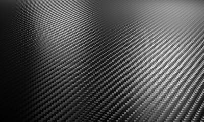  3d abstract background with repeated carbon fiber texture. nobody around. horizontal format.