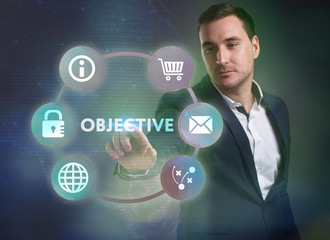 Business, Technology, Internet and network concept. Young businessman working on a virtual screen of the future and sees the inscription: Objective