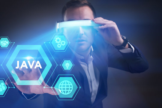 Business, Technology, Internet and network concept. Young businessman working in virtual reality glasses sees the inscription: Java