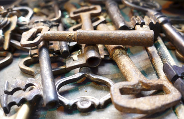 Bunch of vintage antique keys as background                          