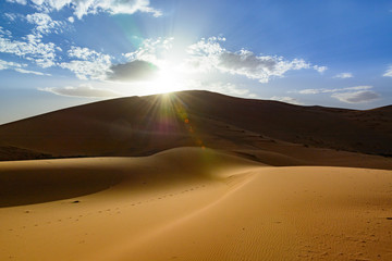 Fototapeta na wymiar sunset in the Sahara desert, Erg Chebi dunes. Merzouga, Morocco