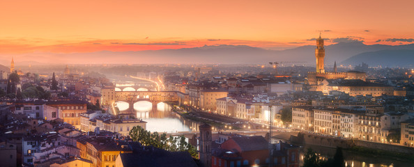 Fototapeta na wymiar Arno River and Basilica at sunset Florence, Italy