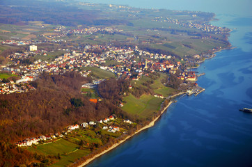 Aerial view of Meersburg, its ferry port and vineyards at Lake Constance, South  Germany in spring