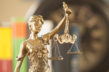 justice symbol  woman holding scale