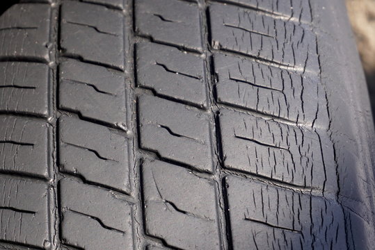 An old worn-out tire close, background