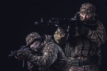 Elite squad soldiers with weapons and ammunition