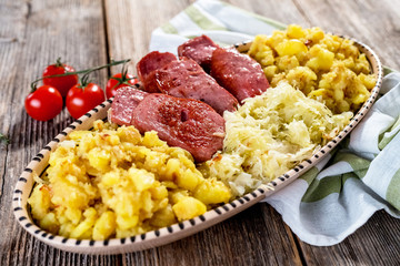 Leberkaese; Sauerkraut and roasted potatoes