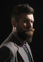 Advertising barbershop concept. Silhouette man with beard and mustache in vintage style. Hipster profile portrait. Silhouette serious bearded man.