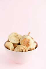 dried figs pink cup isolated