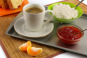 Breakfast includes coffee, cottage cheese, jams and bread rolls