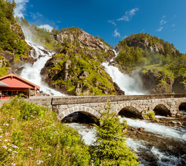 Fototapeta na wymiar Latefossen twin waterfall in Odda Norway