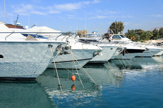 Summer time beautiful yachts moored in Glyfada port, Athens, Greece.