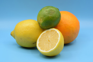 Citrus fruits on seamless blue background