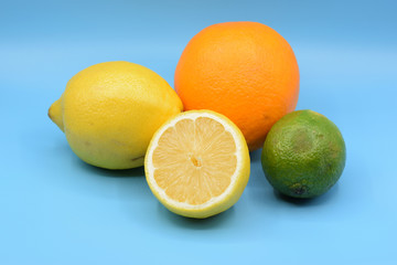 Citrus fruits on seamless blue background