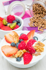 breakfast with yogurt,strawberry rasperry and cereals