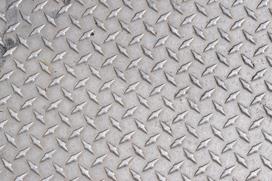 Grungy diamond plate texture background