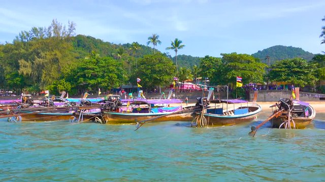 A lot of a long-tail boats on the Railay beach in Krabi province, Thailand