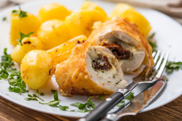 Chicken breast stuffed with cheese and dried tomatoes.