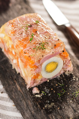 Terrine with ham, egg, carrot and horseradish