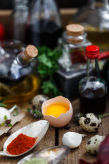 Sauces, oils and spices in a old wooden box