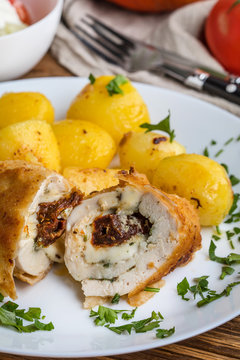 Chicken breast stuffed with cheese and dried tomatoes.