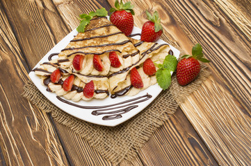 Crepes with Banana and strawberries