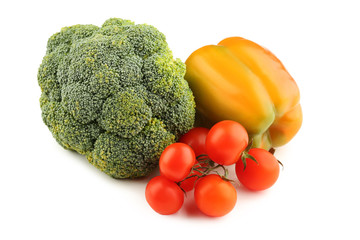 Ripe pepper, broccoli and tomatoes isolated on white background