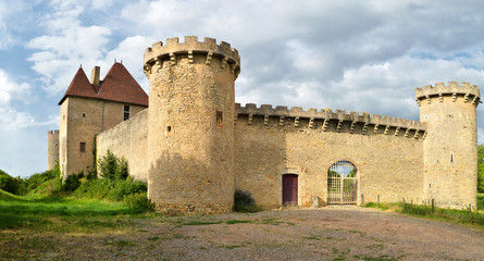 Fototapeta na wymiar A beautiful medieval castle in the Auvergne region, in France.