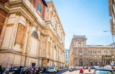 Beautiful street with ancient buildings in the center of Milan, Italy