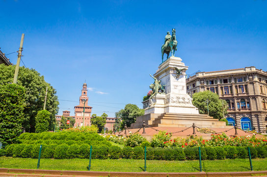 Giuseppe Garibaldi Monument and tower of Sforza Castle - Castello Sforzesco in Milan, Italy