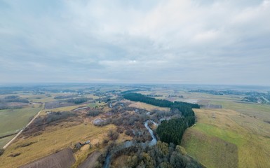 Fototapeta na wymiar Aerial panorama of river and fields
