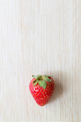 fresh strawberries on wooden table