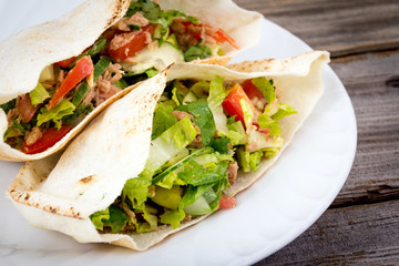 tuna salad pita sandwich closeup dish