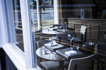 Table setting at modern restaurant, table set for meal,