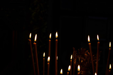 Burning candles in church