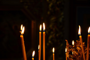 Burning candles in church