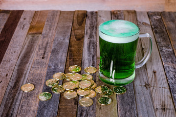 St. Patrick’s mug of green beer golden coins