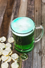 St. Patrick’s mug of green beer golden coins