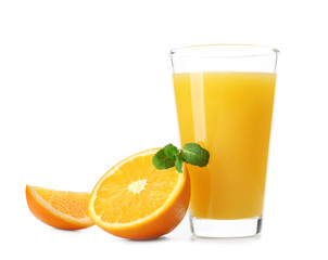 Glass of fresh orange juice with fruit slices on white background