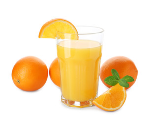 Glass of fresh orange juice with fruit on white background