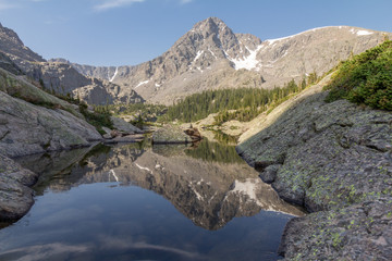 Reflections of Mt of the Holy Cross in the Holy Cross Wilderness, Colorado, USA.