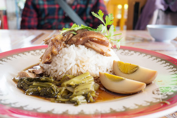 Stewed pork leg on cooked rice