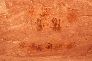 Ancient hand prints left on canyon wall by the anizazi people of  southern Utah Canyon country.