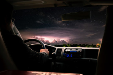 Driving to bad weather conditions on the road during rain storm