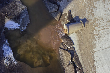 Sewage drains into the pond
