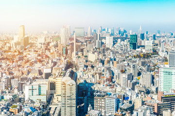 Asia Business concept for real estate and corporate construction - panoramic modern city skyline aerial view of Shinjuku area under blue sky in Tokyo, Japan