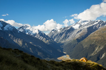 Fototapeta na wymiar Tent overlooking glacial valley of Mt Aspiring National Park