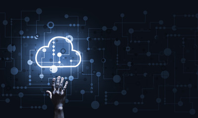 Technology idea concept with glowing cloud icon and touching it finger